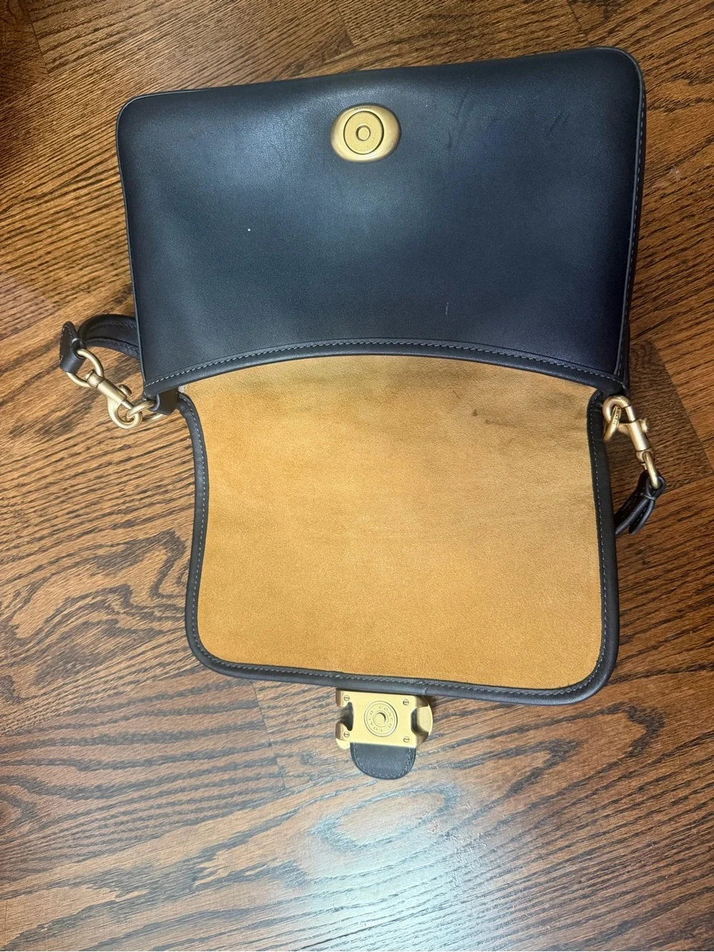 Coach Black Leather Shoulder Bag with Gold 'C' Accent